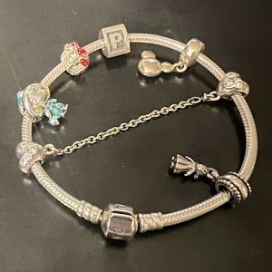 Pandora bracelet with Disney charms.